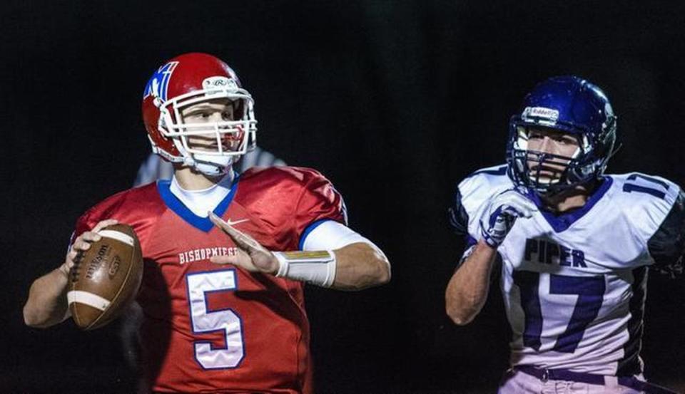 Bishop Miege quarterback Ryan Willis (left), the No. 3 recruit in Kansas according to Rivals.com, signed a letter of intent on Wednesday with Kansas.