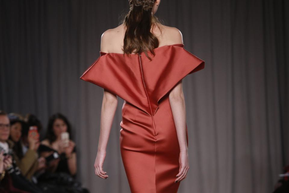 The Zac Posen Fall 2014 collection is modeled during Fashion Week in New York, Monday, Feb. 10, 2014. (AP Photo/Jason DeCrow)