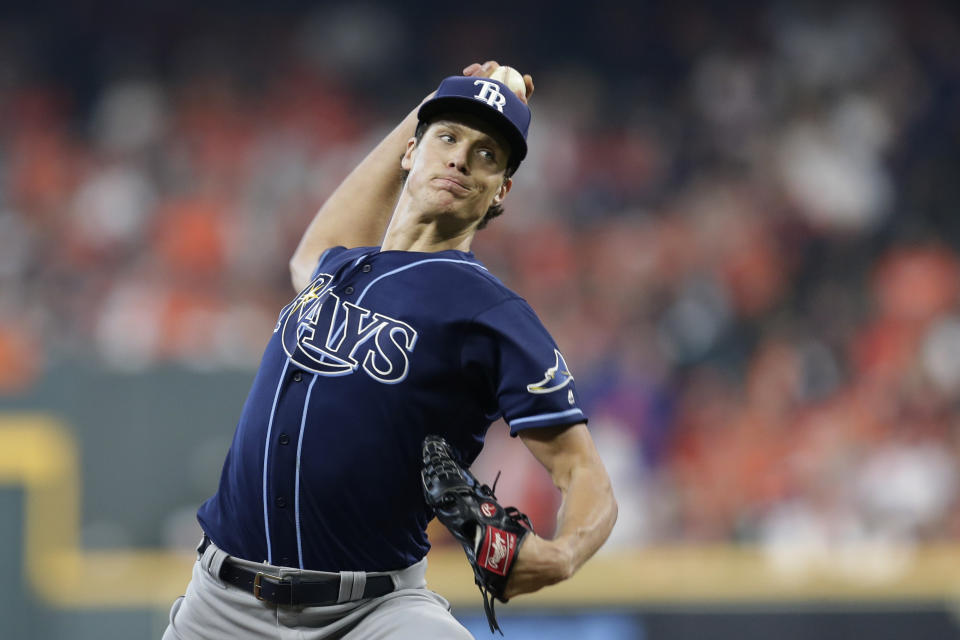 Tampa Bay Rays starting pitcher Tyler Glasnow (20) delivers a pitch against the Houston Astros in the first inning during Game 1 of a best-of-five American League Division Series baseball game in Houston, Friday, Oct. 4, 2019. (AP Photo/Michael Wyke)