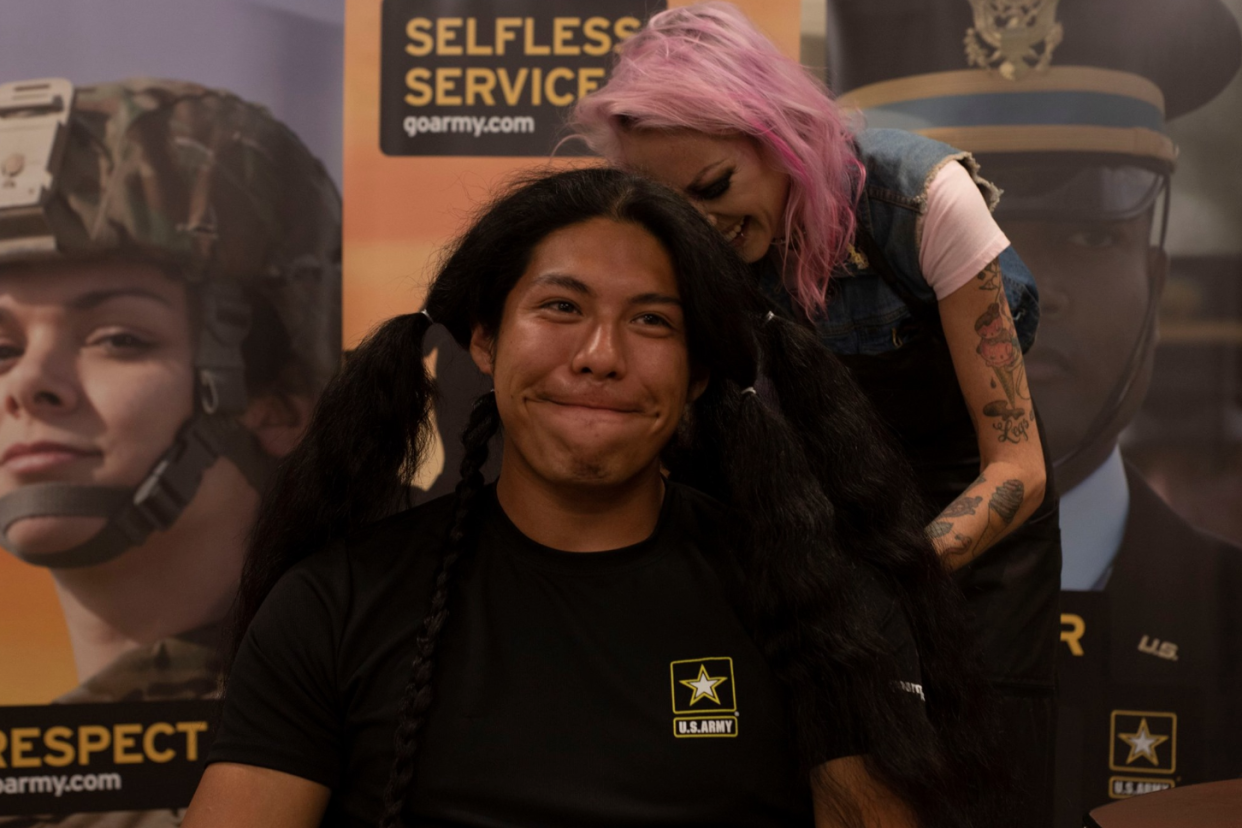 Reynaldo Arroyo, 23, cuts his hair for the first time in 15 years in order to enlist in the United States Army. (Photo: Facebook)