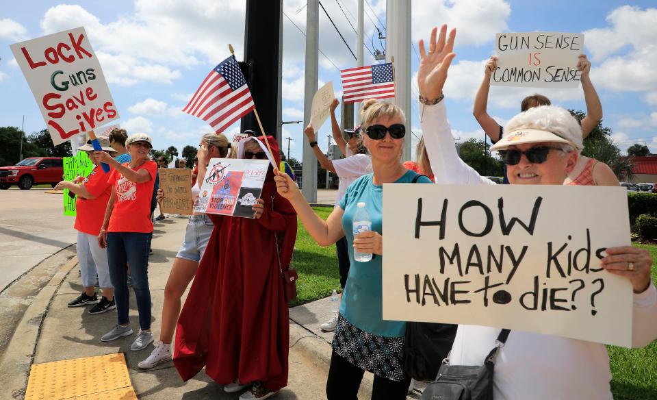March For Our Lives protesters gather at the corner of U.S. 1 and Dunlawton Avenue in Port Orange on Saturday, June 11, 2022.