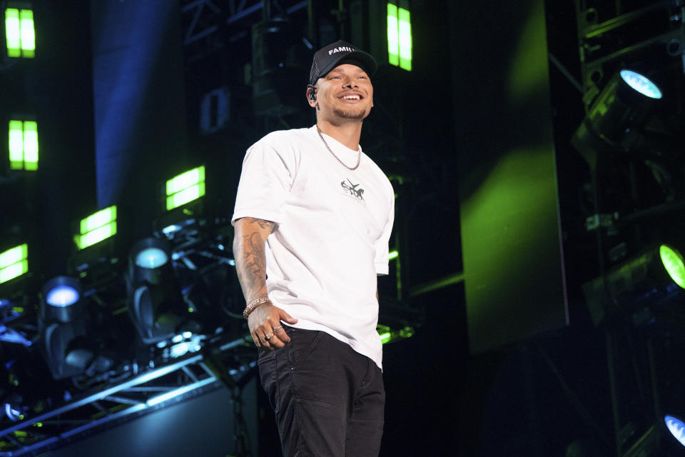 FILE - Kane Brown performs during CMA Fest 2022 on Friday, June 10, 2022, at Nissan Stadium in Nashville, Tenn. Brown is among the headliners at this year's New Orleans Jazz & Heritage Festival, which takes place over two weekends beginning April 28. (Photo by Amy Harris/Invision/AP, File)