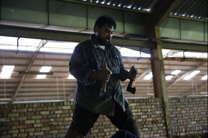 Walid (Megat Sharizal) is ready to teach some lessons after school. Photo courtesy of Outsider Pictures