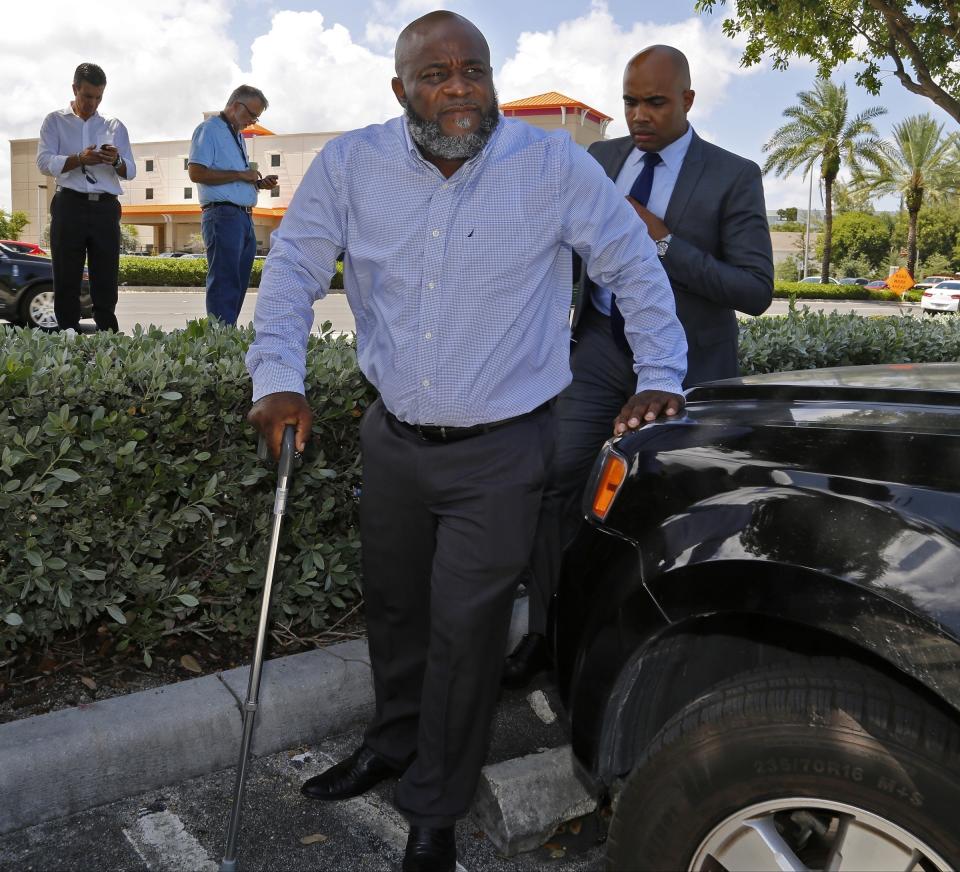 FILE - In this July 28, 2016, file photo, healthcare professional Charles Kinsey, shot by a North Miami police officer on July 18, 2016, while trying to protect an autistic patient, makes his first public appearance in Aventura, Fla. An appeals court ordered a new trial on Wednesday, Feb. 16, 2022, for Jonathan Aledda, a former Florida police officer who was sentenced to probation for shooting at a severely autistic man and wounding the man’s caretaker. (Carl Juste/Miami Herald via AP, File)