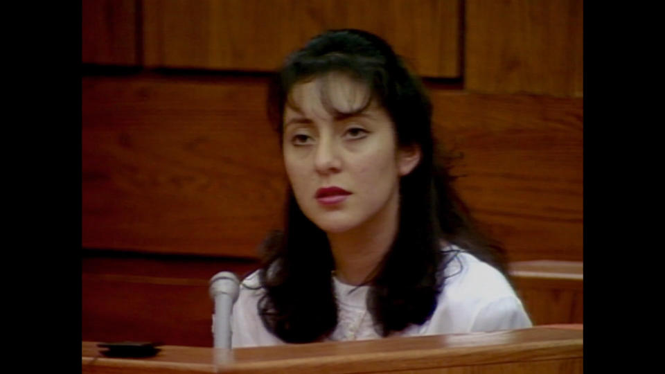 A still of Lorena Bobbitt in court from the series Lorena