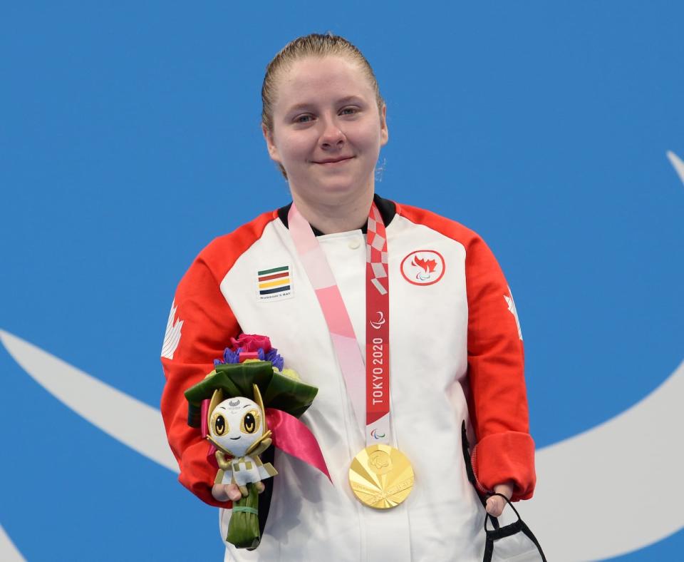 Canada's Danielle Dorris, from Moncton, N.B., wears her gold medal after winning the women's 50m butterfly at the 2020 Paralympic Games in Tokyo, Japan on Friday, Sept.3, 2021. THE CANADIAN PRESS/HO-Canadian Paralympic Committee-Scott Grant MANDATORY CREDIT