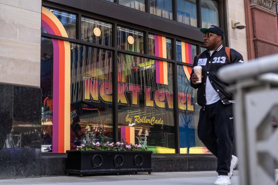 Signage in the window as work continues before the opening of the new downtown Detroit location on Woodward Avenue of Next Level by RollerCade on Monday, April 15, 2024, in time for the NFL draft.