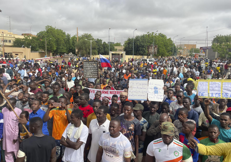 Supporters of Niger's ruling junta, gather for a protest called to fight for the country's freedom and push back against foreign interference, in Niamey, Niger, Thursday, Aug. 3, 2023. The march falls on the West African nation's independence day from its former colonial ruler, France, and as anti-French sentiment spikes, more than one week after mutinous soldiers ousted the country's democratically elected president. (AP Photo/Sam Mednick)