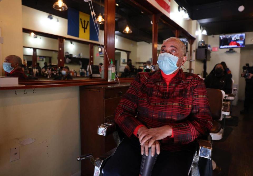 June Everett’s eyes swells with tears as she sit glued to the flat screen during the telecast of the Inauguration. On Wednesday, January 20, 2021 Barbados-born barber shop owner June Everett watches along with customers and employees the Inauguration of President-elect Joe Biden and Vice President-elect Kamala Harris as the nationÕs first Hispanic Supreme Court justice, Sonia Sotomayor swears in the first African-American woman of Caribbean and East Asian descent as vice president of the United States. Everett barber shop is in the heart of the U street just few block alway from HBCU, Howard University, where Vice-President Kamala Harris went to college.