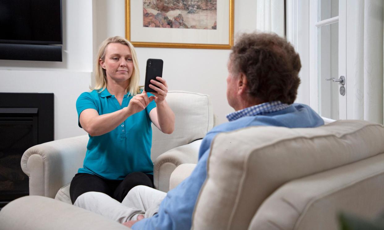 <span>PainChek is a phone app that uses AI-trained facial recognition to identify whether someone incapable of speaking is in pain.</span><span>Photograph: PainChek</span>