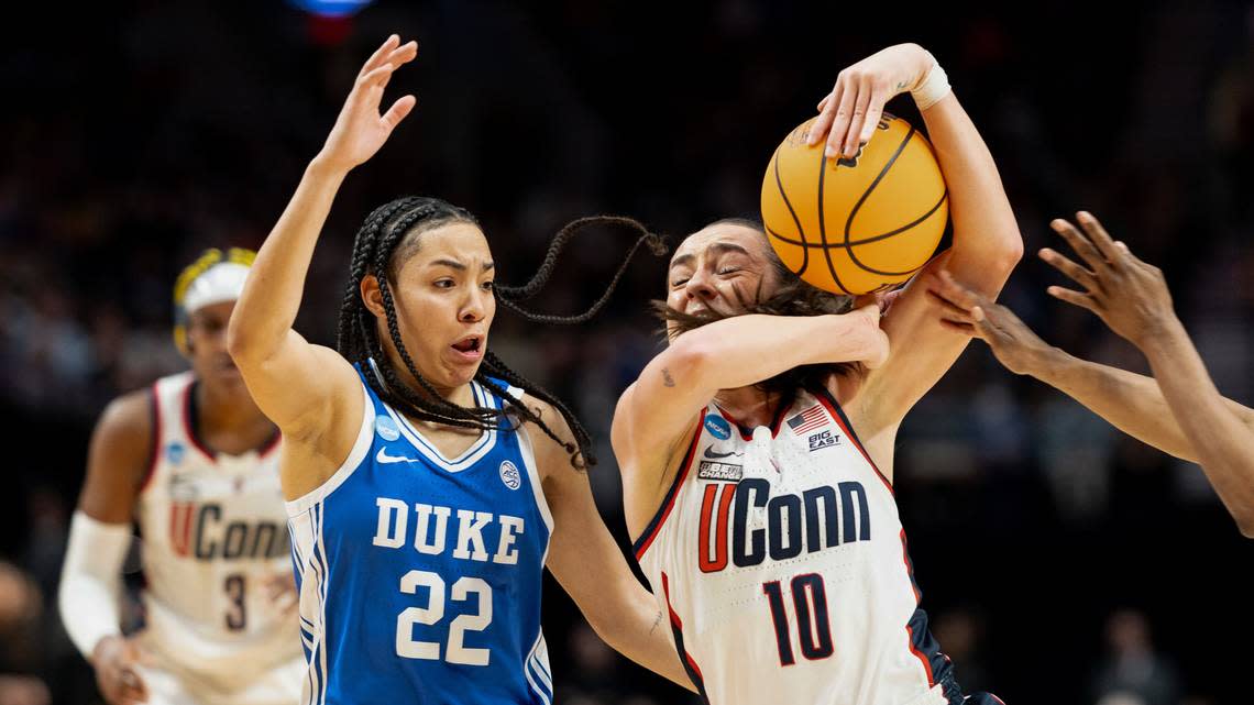 Duke’s Taina Mair defends against UConn’s Nika Mühl in first half action of the NCAA Sweet 16 game in Portland, Saturday night, March 30, 2024.