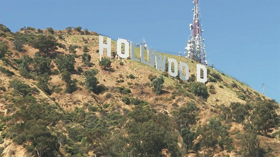 The Hollywood sign, an iconic symbol of Los Angeles, was erected in 1923 to sell real estate. It was supposed to be temporary.  / Credit: CBS News