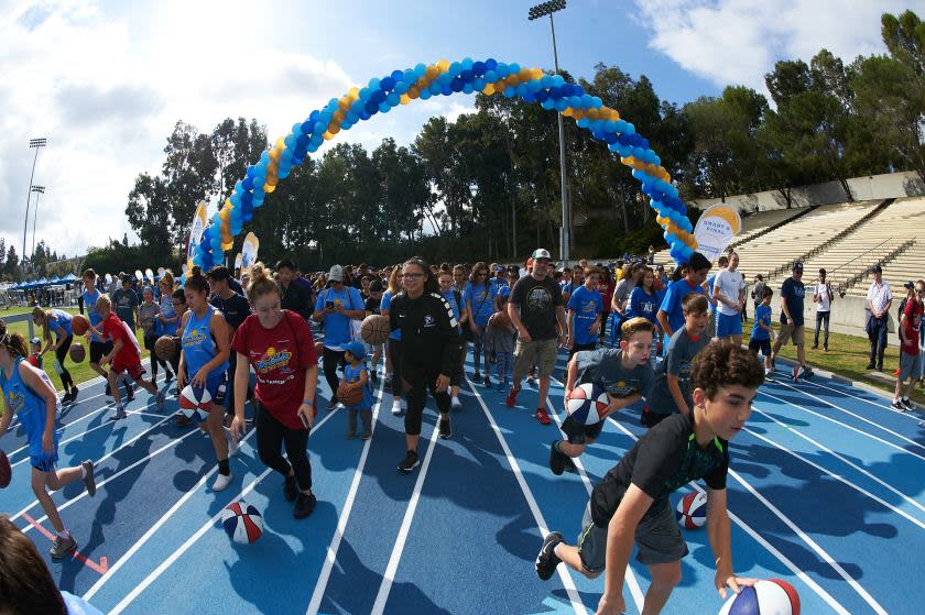 UCLA Athletics - 2018 Dribble for the Cure with the UCLA Men's and Women's Basketball teams in 2018.