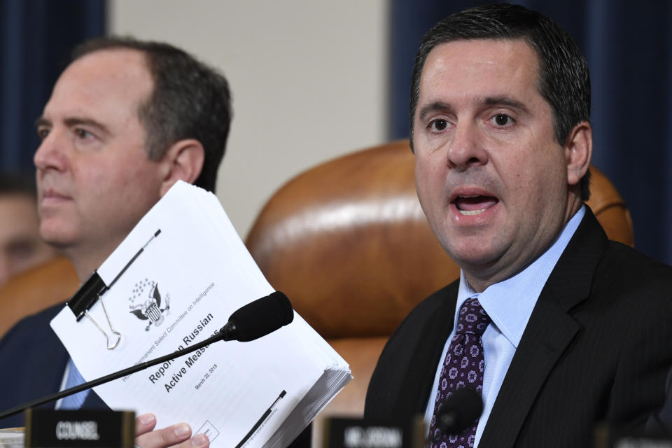 Ranking member Rep. Devin Nunes of Calif., gives an opening statement as former White House national security aide Fiona Hill, and David Holmes, a U.S. diplomat in Ukraine, testify before the House Intelligence Committee on Capitol Hill in Washington, Thursday, Nov. 21, 2019, during a public impeachment hearing of President Donald Trump's efforts to tie U.S. aid for Ukraine to investigations of his political opponents. At left is House Intelligence Committee Chairman Adam Schiff, D-Calif. (AP Photo/Susan Walsh)