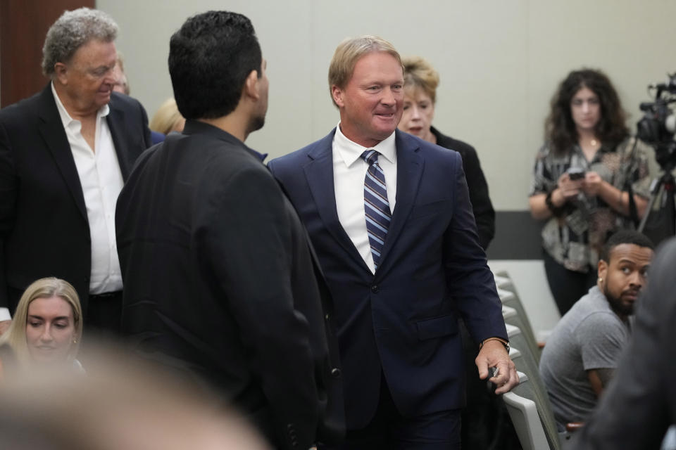 Jon Gruden appears in court Wednesday, May 25, 2022, in Las Vegas. A Nevada judge heard a bid Wednesday by the National Football League to dismiss former Las Vegas Raiders coach Jon Gruden's lawsuit accusing the league of a "malicious and orchestrated campaign" including the leaking of offensive emails ahead of his resignation last October. (AP Photo/John Locher)