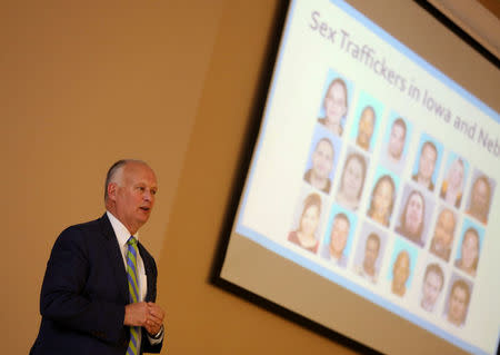 Nebraska Attorney General Doug Peterson talks about sex traffickers in Iowa and Nebraska during a human trafficking seminar, where opponents of the proposed Keystone XL Pipeline expressed concerns that "man camps" created during construction of the pipeline might bring the sex trade to their area in O'Neill, Nebraska, U.S. April 12, 2017. REUTERS/Lane Hickenbottom