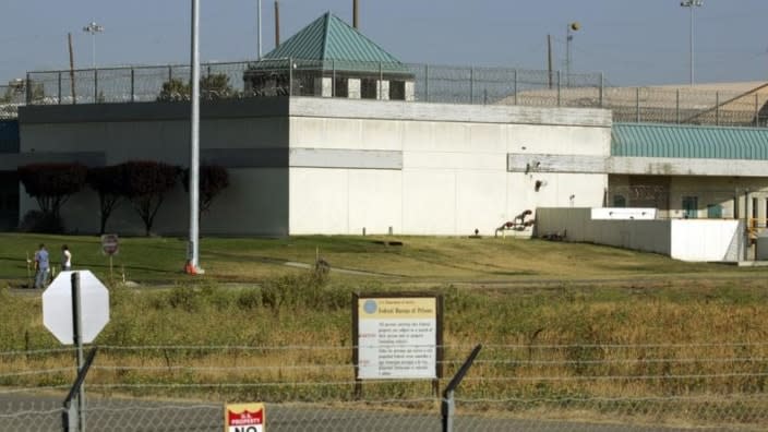 The Federal Correctional Institution is shown in Dublin, California. Ray J. Garcia, its former warden, will go on trial Monday after prosecutors say he sexually abused several inmates, forced them to pose nude for him and kept photos of the naked prisoners on his government cellphone. (Photo: Ben Margot/AP, File)