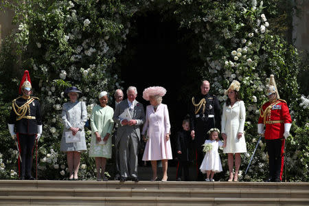 Doria Ragland, the Prince of Wales, the Duchess of Cornwall, the Duke and Duchess of Cambridge with Prince George and Princess Charlotte leave St George's Chapel in Windsor Castle after the wedding. leave St George's Chapel in Windsor Castle after their wedding in Windsor, Britain, May 19, 2018. Jane Barlow/Pool via REUTERS