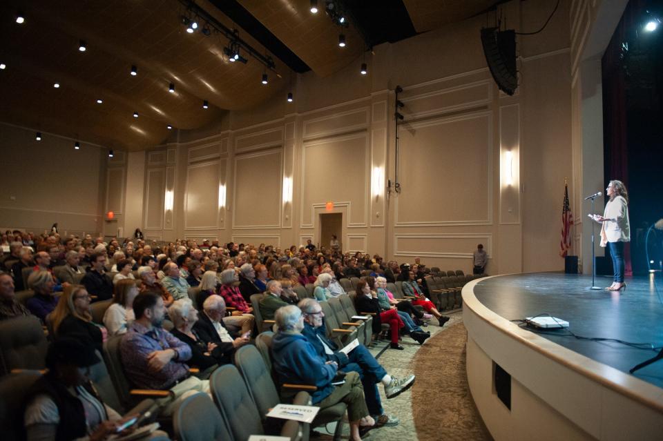 The audience listens to host Megan Finnerty at the Arizona Storytellers Project's "Growing Up" event at the Madison Center for the Performing Arts in Phoenix on March 10, 2020.