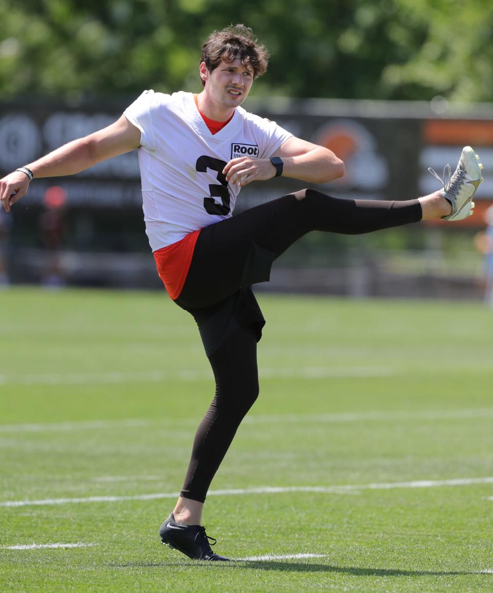 Cleveland Browns kicker Cade York stretches during training camp on Saturday, July 30, 2022 in Berea.