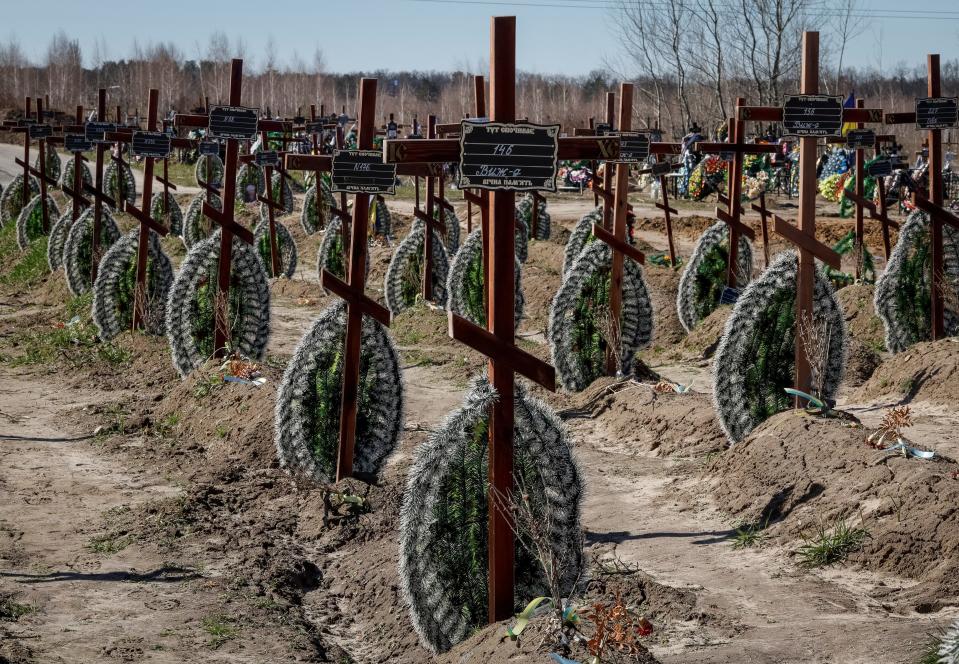 Graves of unidentified people killed by Russian soldiers during occupation of the Bucha town, are seen at the town's cemetery before the first anniversary of its liberation (REUTERS)