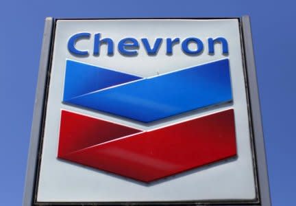 A Chevron gas station sign is seen in Del Mar, California, in this April 25, 2013 file photo. REUTERS/Mike Blake/File Photo