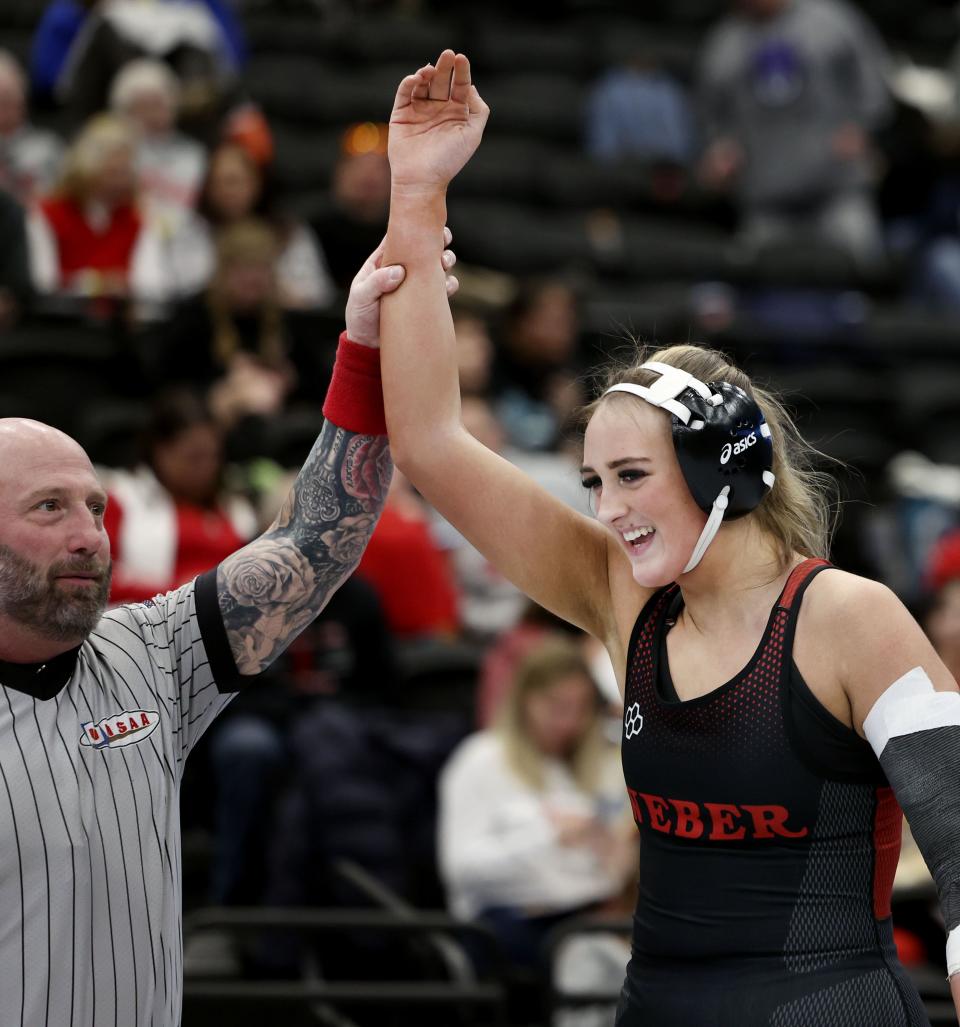 Weber’s Kayla Boatwright celebrates her win against Copper Hills’ Seini Lutui in the 6A State Championships at Utah Valley University in Orem on Wednesday, Feb. 14, 2024. | Laura Seitz, Deseret News