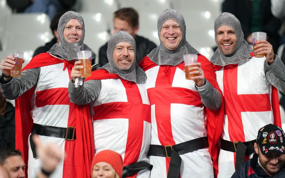 England fans dressed as knights steel themselves before kick-off