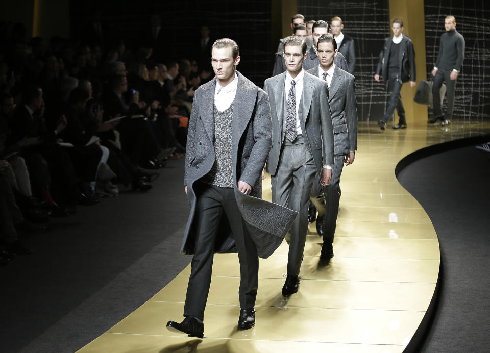 Models wear creations of Ermenegildo Zegna men's Fall-Winter 2013-14 collection, part of the Milan Fashion Week, unveiled in Milan, Italy, Saturday, Jan. 12, 2013. (AP Photo/Antonio Calanni)