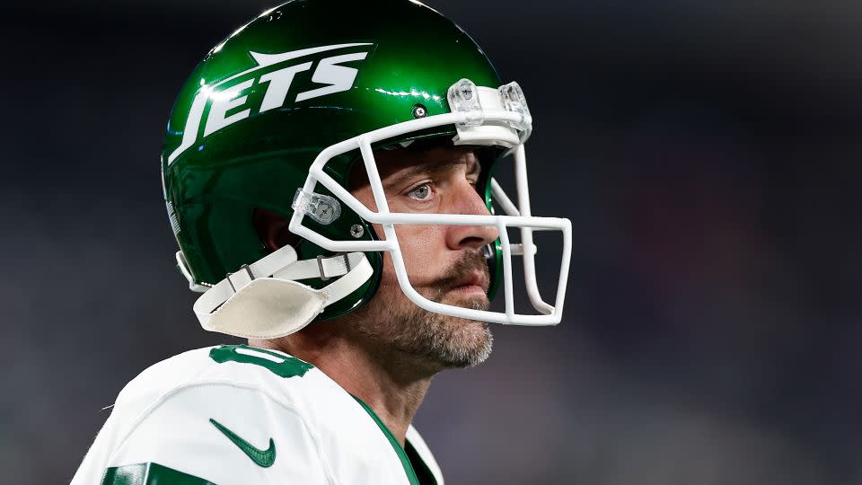 New York Jets quarterback Aaron Rodgers warms up before playing against the Buffalo Bills before the game in which he was injured. - Adam Hunger/AP