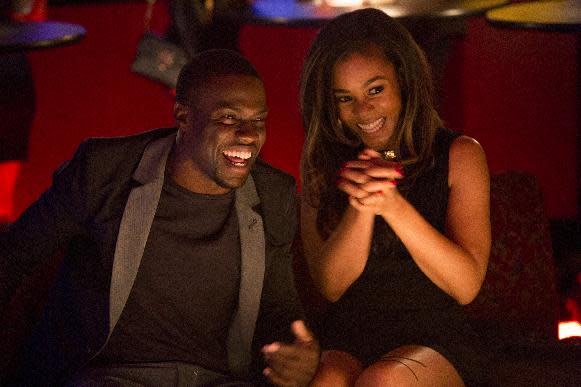 This image released by Sony Pictures shows Kevin Hart, left, and Regina Hall in a scene from the film, "About Last Night." (AP Photo/Sony Pictures, Matt Kennedy)