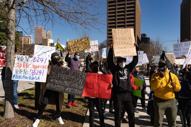 Protesters in Atlanta demonstrated against legislation that added new restrictions on voting to Georgia elections. In March, Republicans, who control the Georgia legislature, made Georgia one of the first states to pass a package of major voting restriction after last November's election. (Photo: Megan Varner via Getty Images)