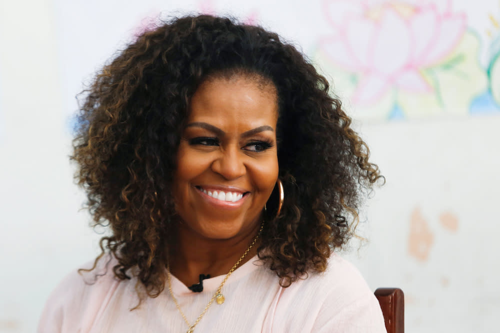 Former first lady Michelle Obama attends the Girls Opportunity Alliance programme with Room to Read at the Can Giuoc Highschool in Long An province, Vietnam December 9, 2019. — Reuters pic