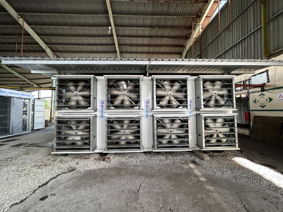 Fans for cooling the machinery at Bityou's site. (Photo: Ryan Weeks/Bloomberg)