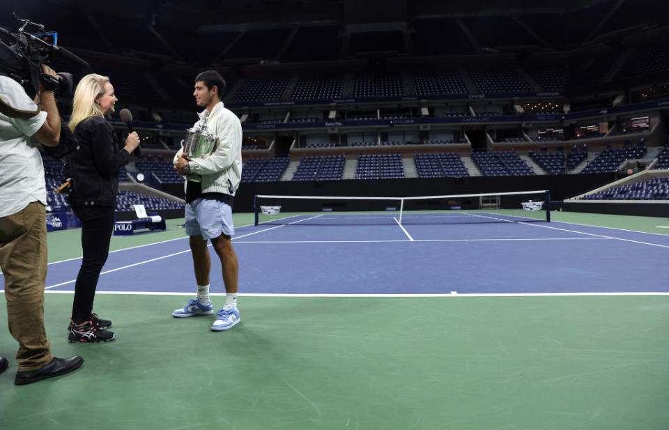 NEW YORK, NEW YORK - SEPTEMBER 11: Carlos Alcaraz of Spain is interviewed following his win over Casper Ruud of Norway during their Men’s Singles Final match on Day Fourteen of the 2022 US Open at USTA Billie Jean King National Tennis Center on September 11, 2022 in the Flushing neighborhood of the Queens borough of New York City. (Photo by Julian Finney/Getty Images)
