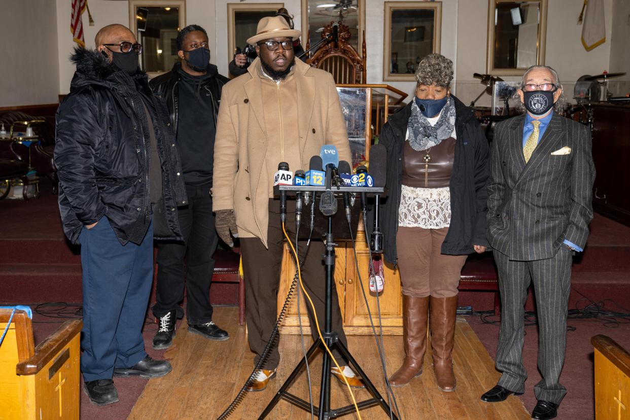 Terrence Floyd, brother of deceased George Floyd, was joined by Gwen Carr, Reverend Kevin McCall (at podium), Pastor David Wright and Attorney Sanford Rubenstein Monday as they addressed the media at the Grace Tabernacle Church on Pacific Street in Brooklyn. 