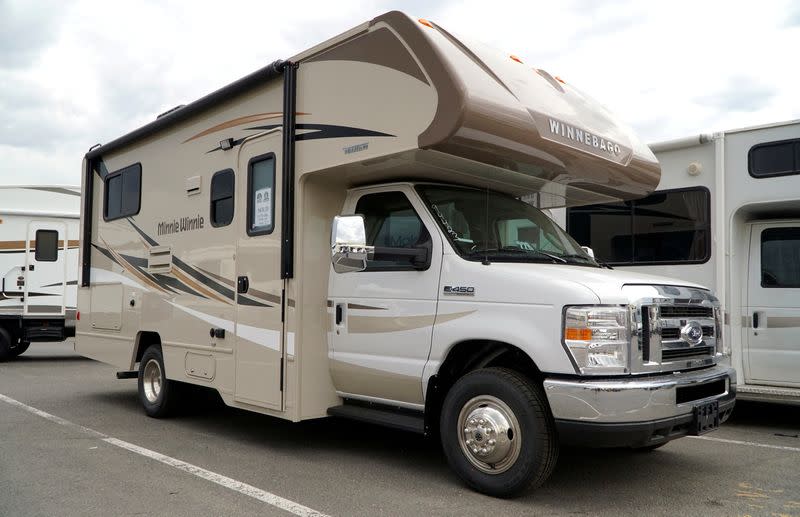 FILE PHOTO: A pair of Winnebago motorhomes are ready for sale at a dealer in Golden