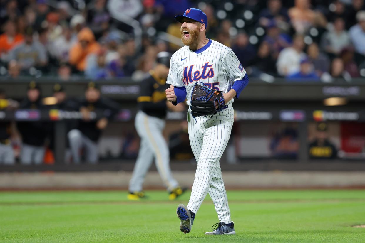 New York Mets relief pitcher Reed Garrett (75) reacts after striking out Pittsburgh Pirates left fielder Bryan Reynolds (not pictured) to end the top of the seventh inning on April 16, 2024, at Citi Field.