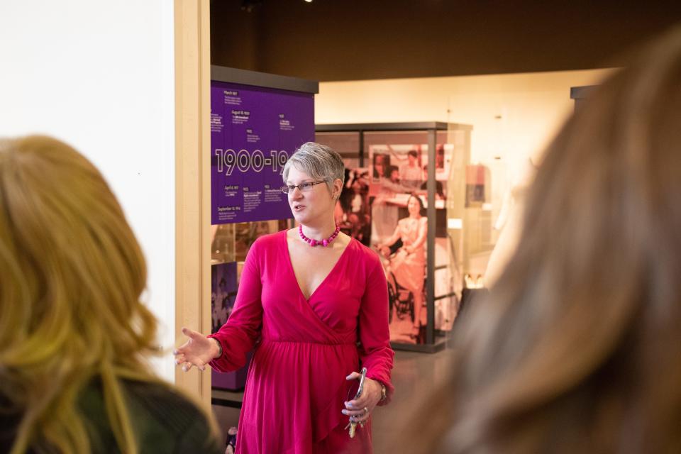 Beth Kowalski, executive director of the Neville Museum, leads a tour of the HerStory exhibit for the Trans Day of Visibility event that took place on Saturday, April 2, in Green Bay, Wisc.