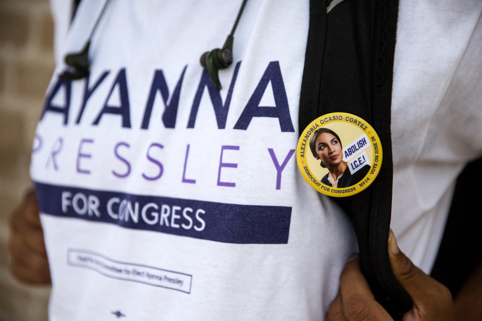 <span class="s1">A Pressley staffer, who assisted Ocasio-Cortez earlier this summer, sports both a Pressley T-shirt and an Ocasio-Cortez pin. (Photo: Kayana Szymczak for Yahoo News)</span>