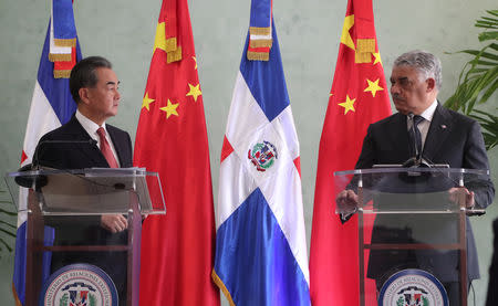 China's Foreign Minister Wang Yi and Dominican Republic's Chancellor Miguel Vargas address the media after signing a bilateral agreement in Santo Domingo, Dominican Republic September 21, 2018. REUTERS/Ricardo Rojas