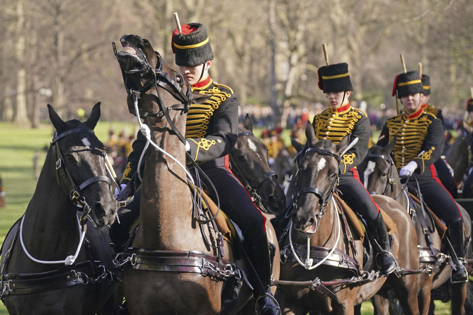 Members of the King's Troop, Royal Horse Artillery ride, ahead of a gun salute in Green Park, to mark the official start of the Platinum Jubilee, in London, Monday, Feb. 7, 2022. (Jonathan Brady/PA via AP)
