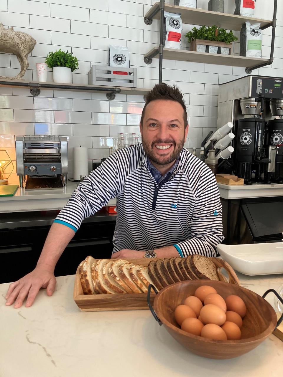 Mike Nazzaro, owner of Laughing Horse Coffee & Tea in Harrison. The coffeehouse is named, in part, because Nazzaro and his wife, Ali, love to laugh. Randomly, once they opened, they found out that 100 years ago the spot they're located at was once the town's main horse stable.  Photographed May 11, 2022.