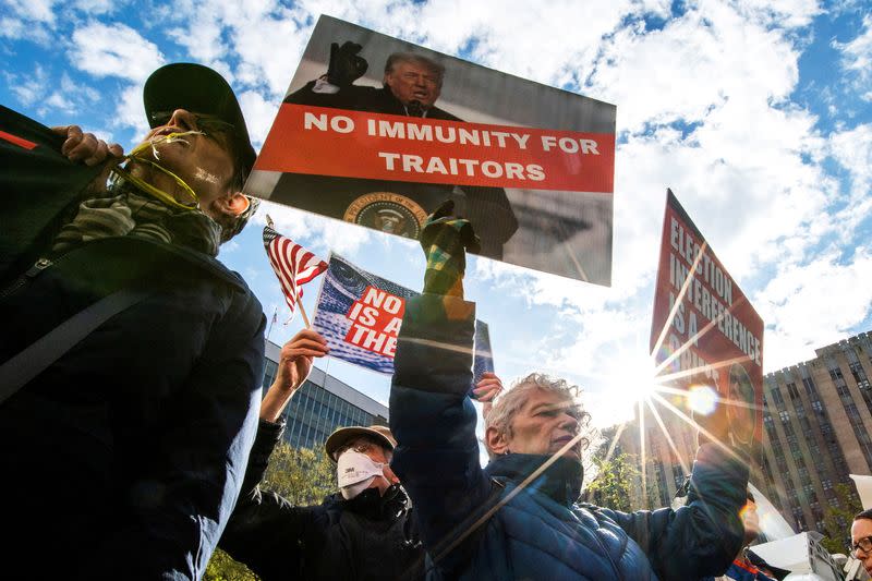 People protest near the Manhattan Criminal Court in New York City