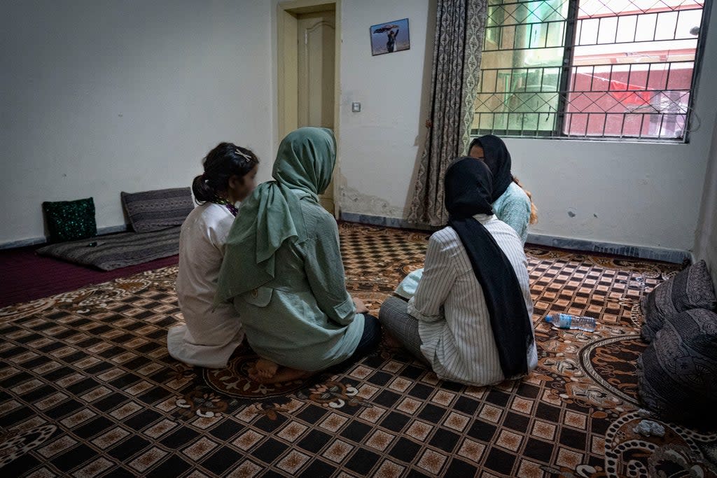 Sima and her sisters in an apartment block outside Islamabad (Bel Trew)