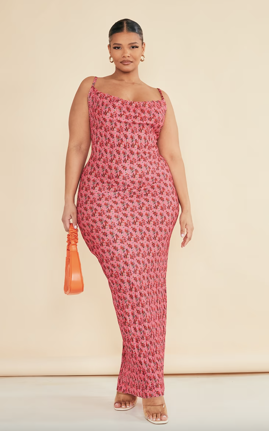 plus size model wearing pink and red maxi dress, Plus Rose Floral Printed Plisse Cowl Neck Maxi Dress (photo via PrettyLittleThing)