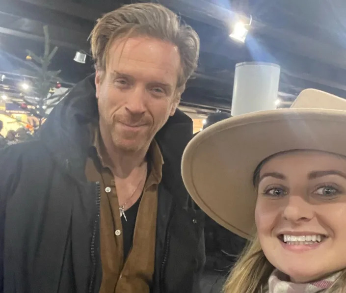 Caroline Rose smiling with Damian Lewis while they're stranded 