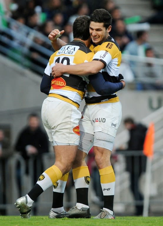 La Rochelle's players react after scoring their first try against Pau on March 25, 2017