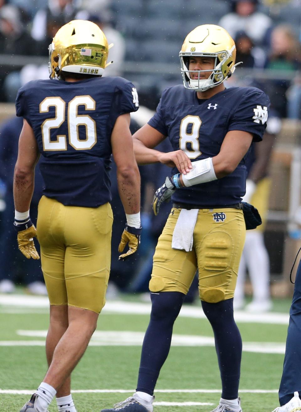 Notre Dame cornerback Isaiah Dunn (26) talks with quarterback Kenny Minchey (8) during the Notre Dame Blue-Gold Spring Football game on Saturday, April 22, 2023, at Notre Dame Stadium in South Bend.