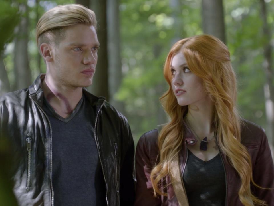 Dominic Sherwood and Katherine McNamara in season one of "Shadowhunters."